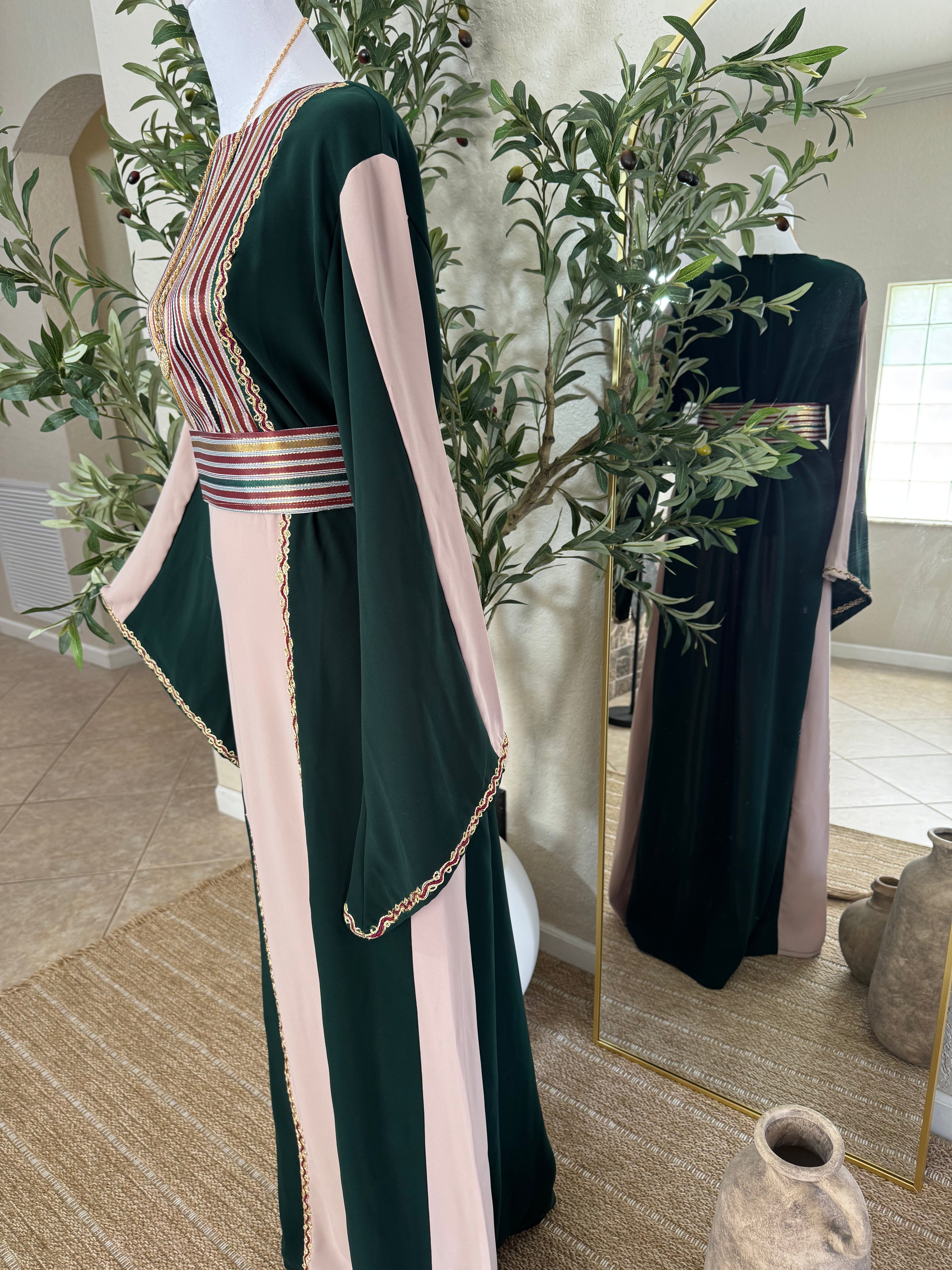 Back view of The Cedar Rose Thoub with graceful flowing fabric and timeless modest fashion design by Amira Designs