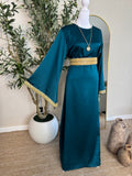 Elegant teal satin modest dress with gold detailing and flowing sleeves
