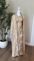 Sandstone Palestinian abaya in warm beige with ivory and gold floral detailing, made in Palestine