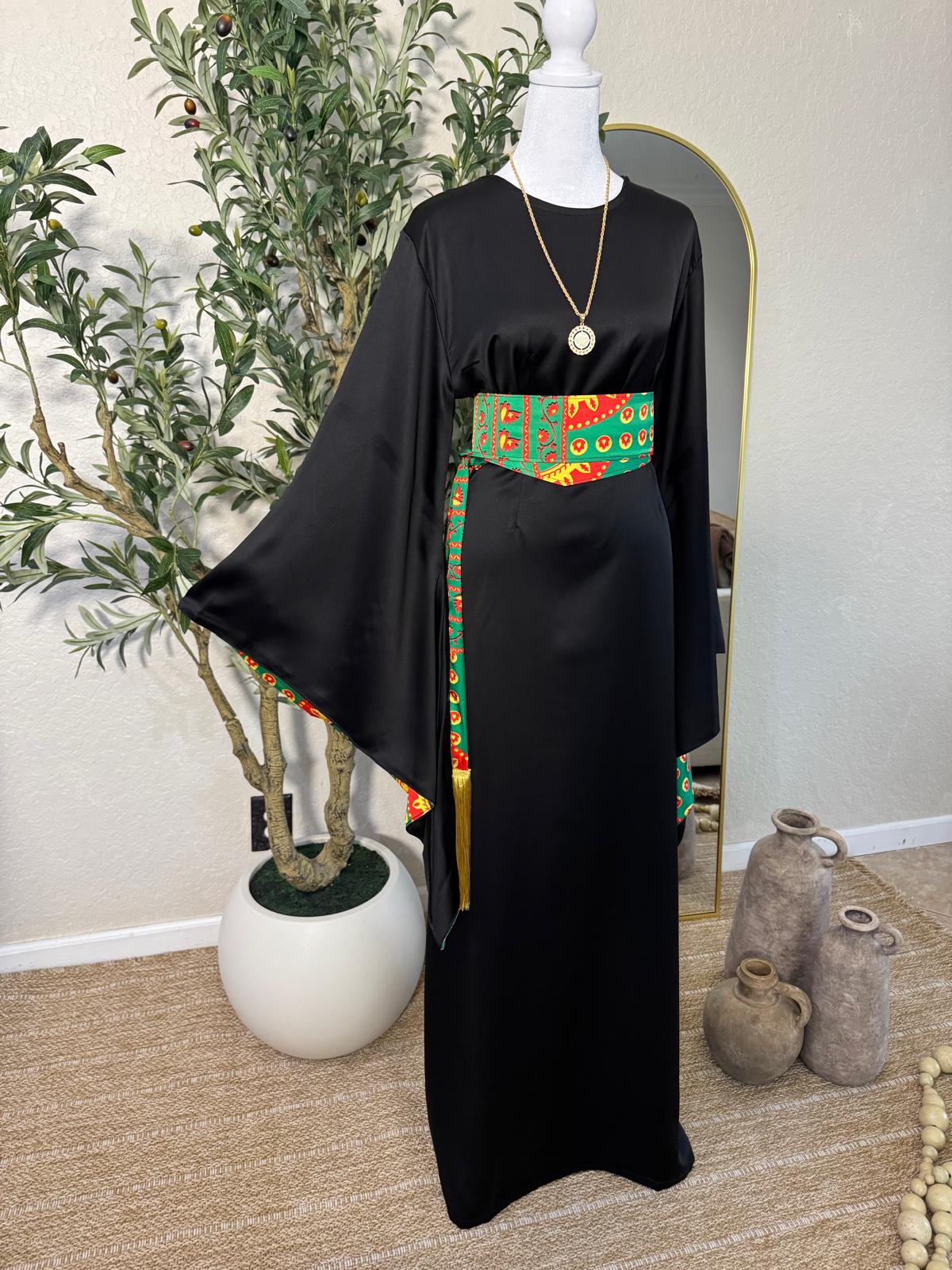 Black satin traditional dress with colorful embroidered Asba waist sash